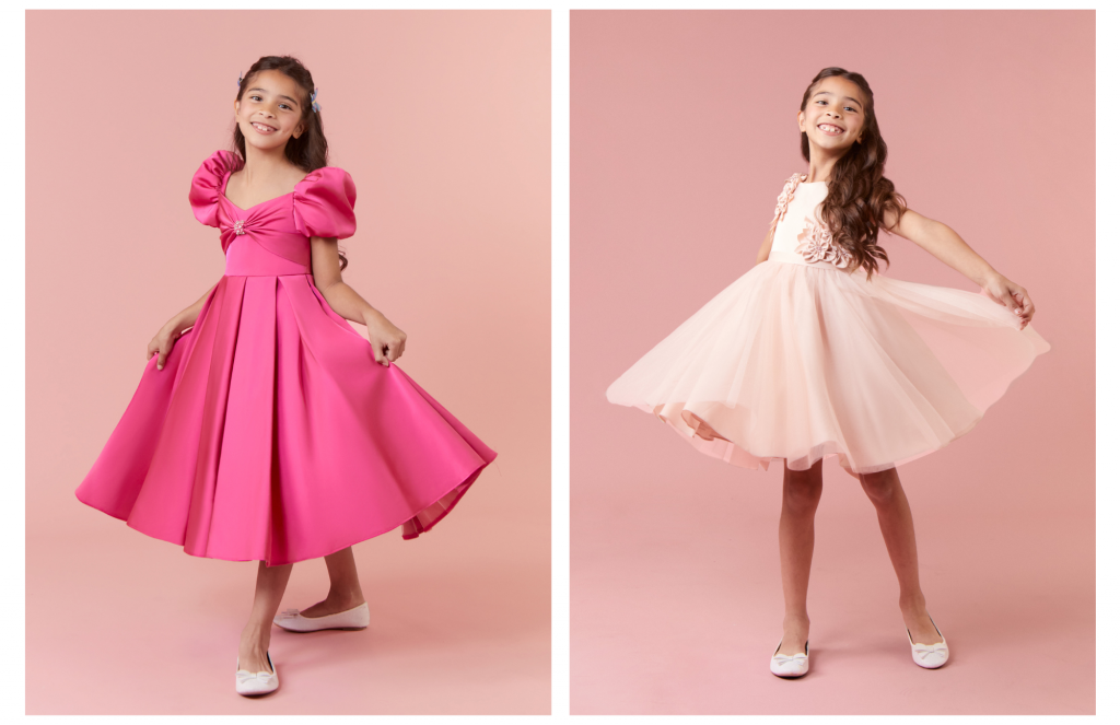 Two flower girls in two different pink fun flower girl dresses.
